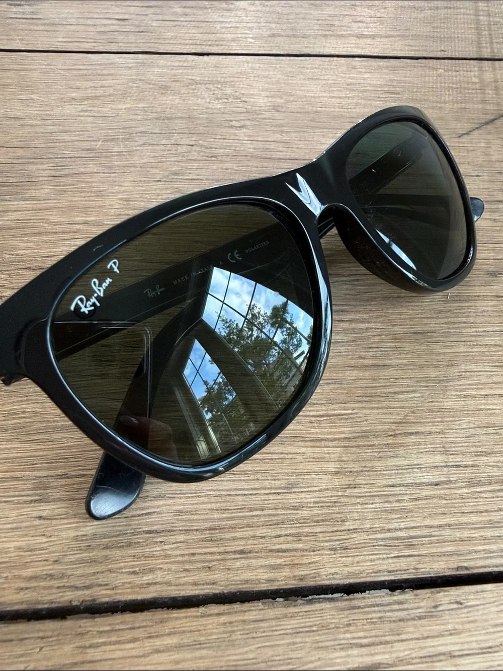 Ray-Ban Black Frame Sunglasses with Dark Green Lenses